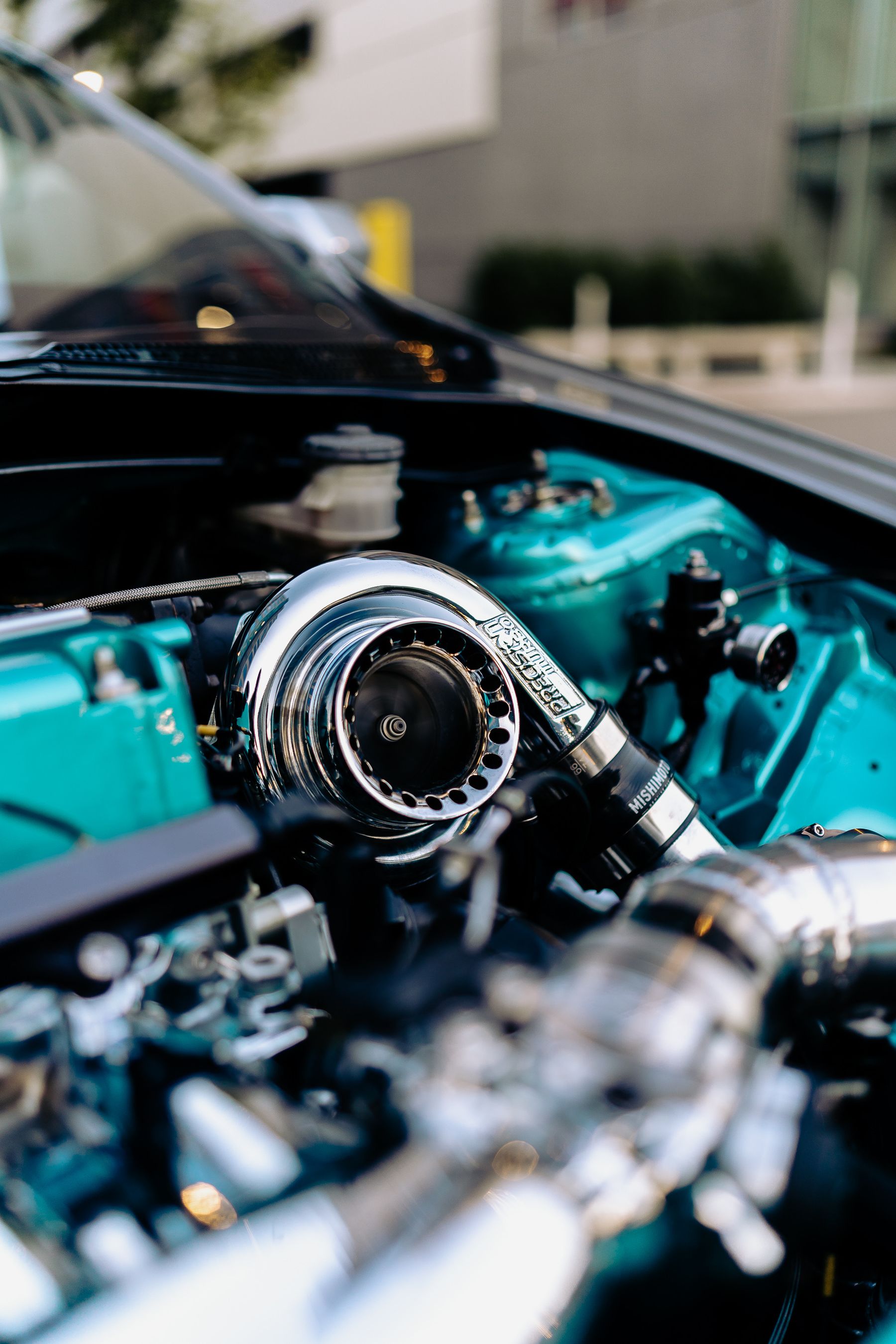 Polished turbocharger in an engine bay